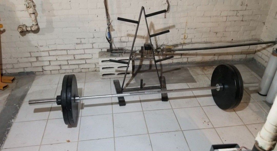 Olympic Weight Lifting Barbell And Weights