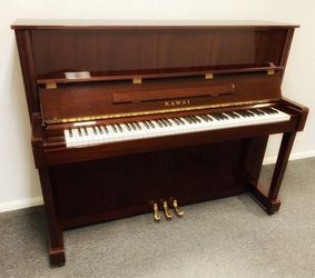 2000 Kawai “CX-5H” Studio Upright Piano delivery + tuning included.