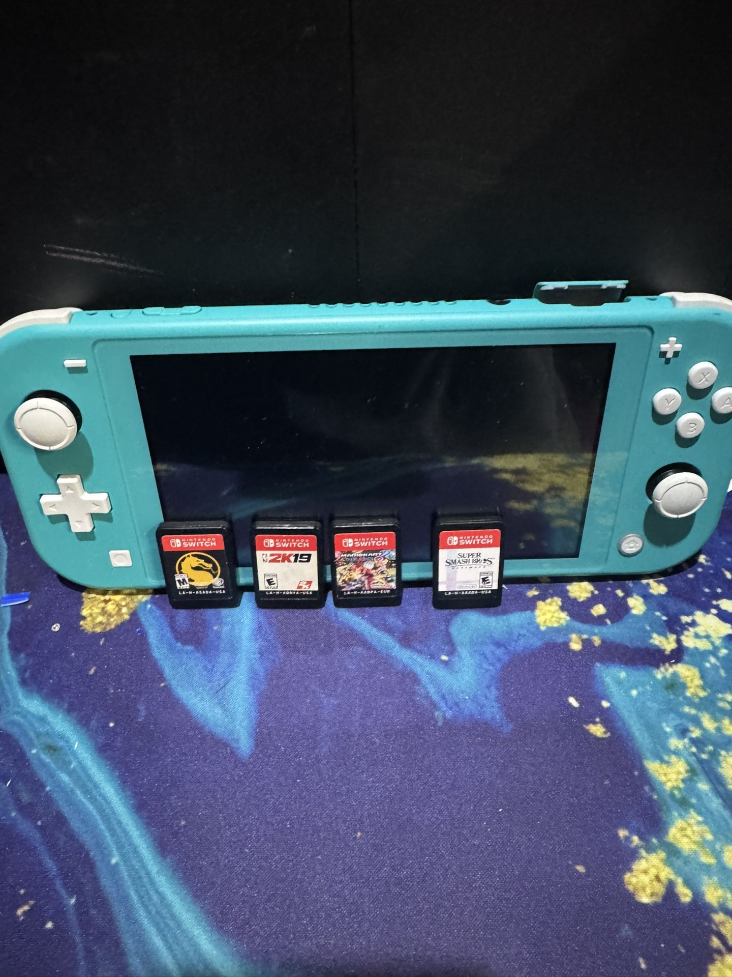 $250 OBO Nintendo Switch Lite W Games Mortal Kombat NBA 2k19 Mario Bros Super smash And Mario Kart All Working And Tested Shoot Ur Offer