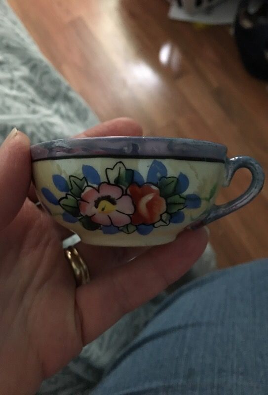 Small antique tea cup with 2 plates