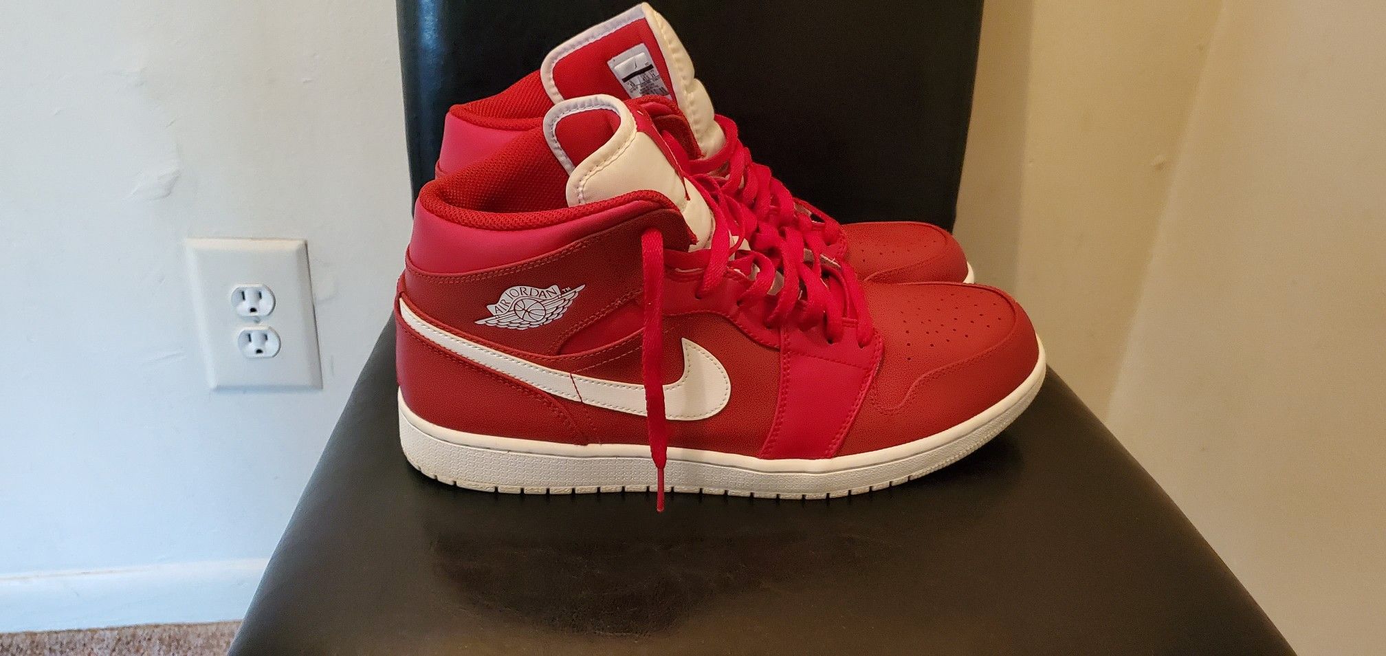 Red and white Air Jordan 1s