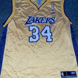 KIDS SIZE  14-16. LAKERS JERSEY SHAQ ONEAL 