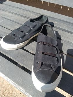Vans Black Canvas Slip-On Sneakers