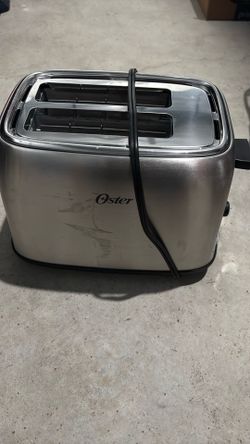 Brand new never used open box Oster stainless steel toaster machine