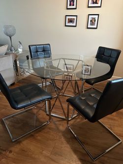 Dining table and chairs set