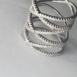 sterling silver triple layered x ring with diamonds accents