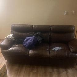 Brown leather couch 🛋️