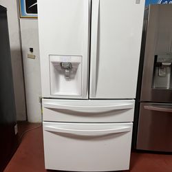 Kenmore 4-door refrigerator with water and ice dispenser, working perfectly. Dimensions: 35 3/4(W) x 39 1/8(D) x 70 1/4(H). Home delivery and installa