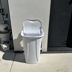 Plastic white swing top garbage bin