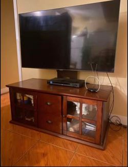 Tv stand with storage cabinets and drawers