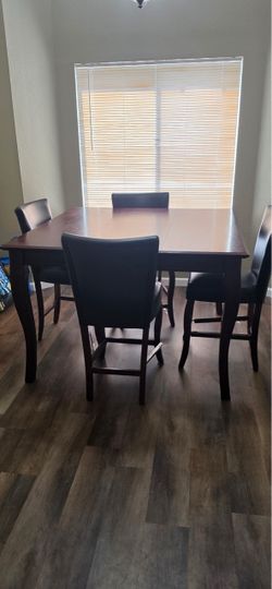 Cherry wood Dinning room table with 4 chairs