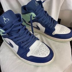 Nike Air Jordan 1 Mid Mystic Navy Mint Foam sneakers.