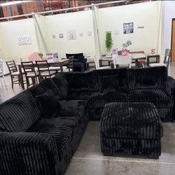 Stylish 4-pc sectional sofa with ottoman black fur-like jumbo corduroy