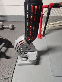 Nhl ball passing machine holds 6 balls