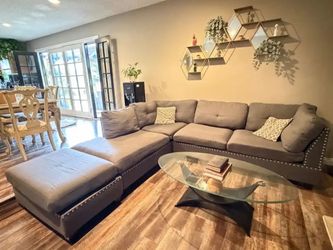 Gray Sectional Sofa with Glass Coffee Table