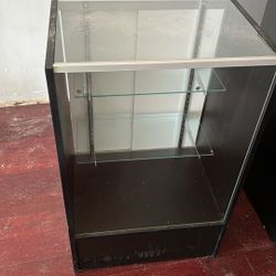 Storefront cabinets, register cabinet, garbage and display