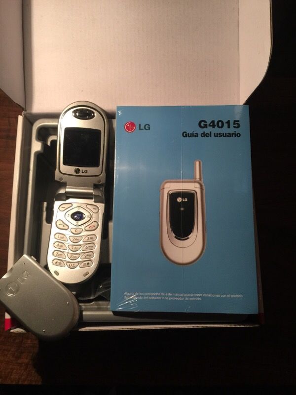 New in the box lg g4015 flip cell phone silver