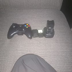 Xbox 360 Controller And A Electrical Battery Charger