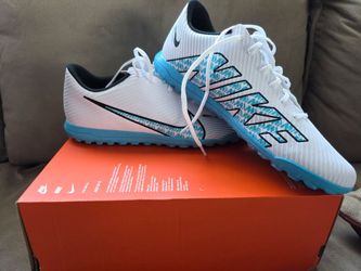 Turf soccer shoes.
