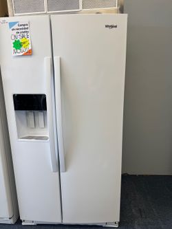 NEW Whirlpool side by side refrigerator