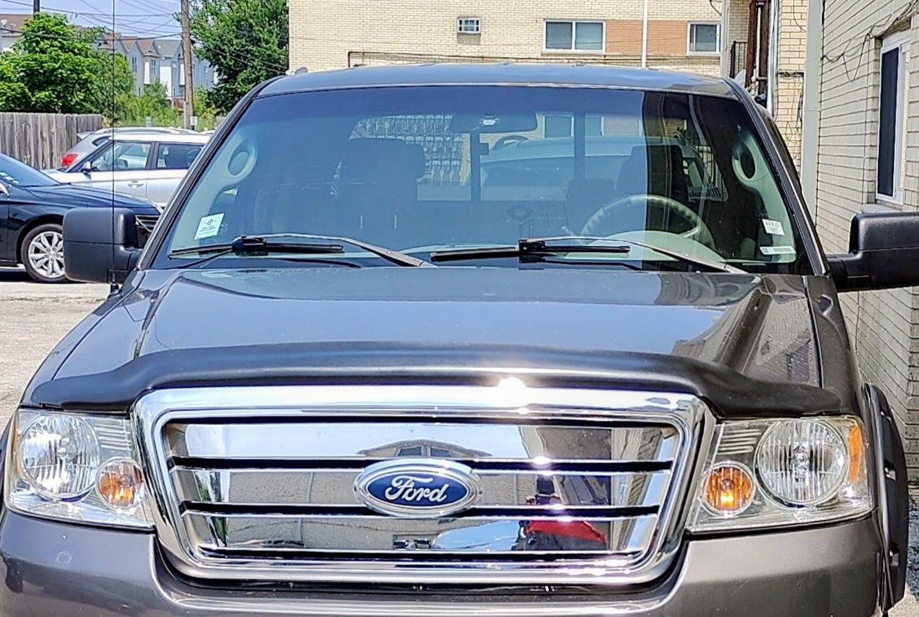 Headlight and grille