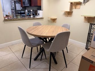 Small round dining table with 4 chairs