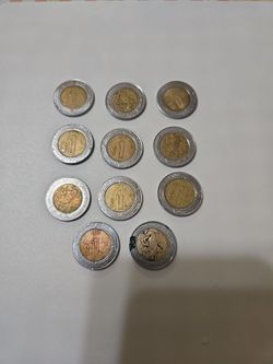 11 $1  Mexican  coins  different  years