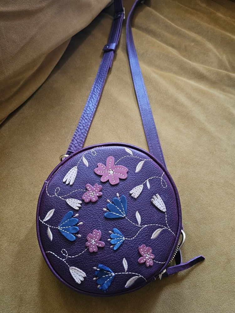 NEVER used. Portland Leather Limited Edition