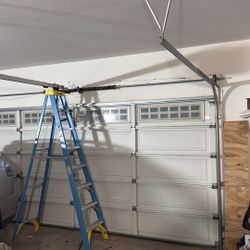 Garage Door Opener Broken Spring Off Track Adjustment Replace And Parts 