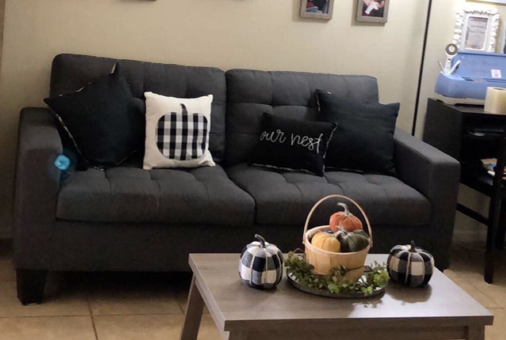 Gray couch and love seat