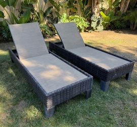 Set of two outdoor wicker chaise lounge chairs - adjustable