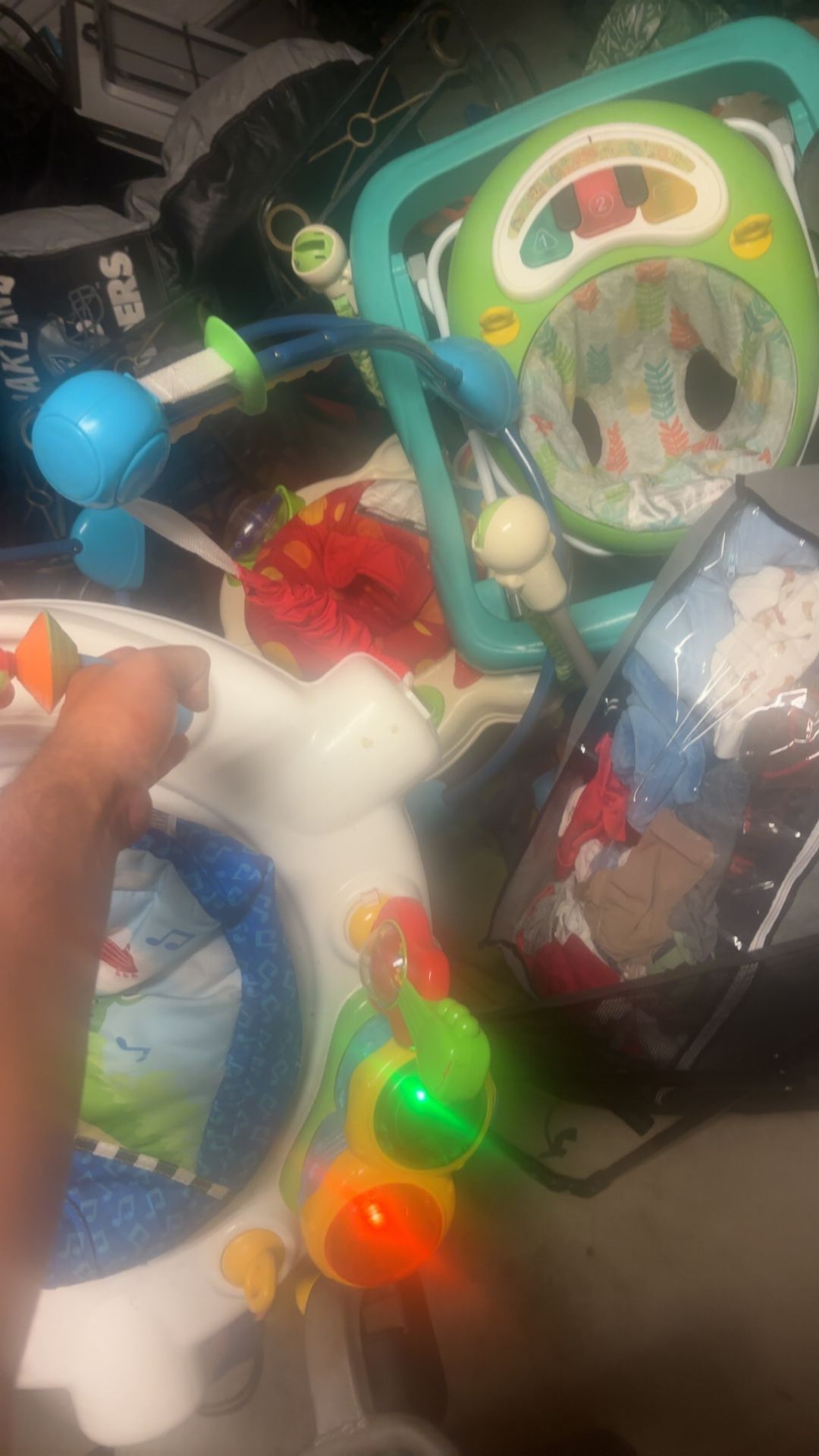 Baby Jumpers And Walker With A Big Tote Of Baby Boy Clothes And Giant Foldable Play Pen