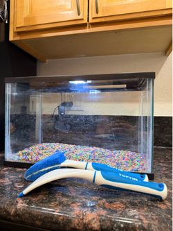 Small Fish Tank with Cleaning Brushes and Pebbles