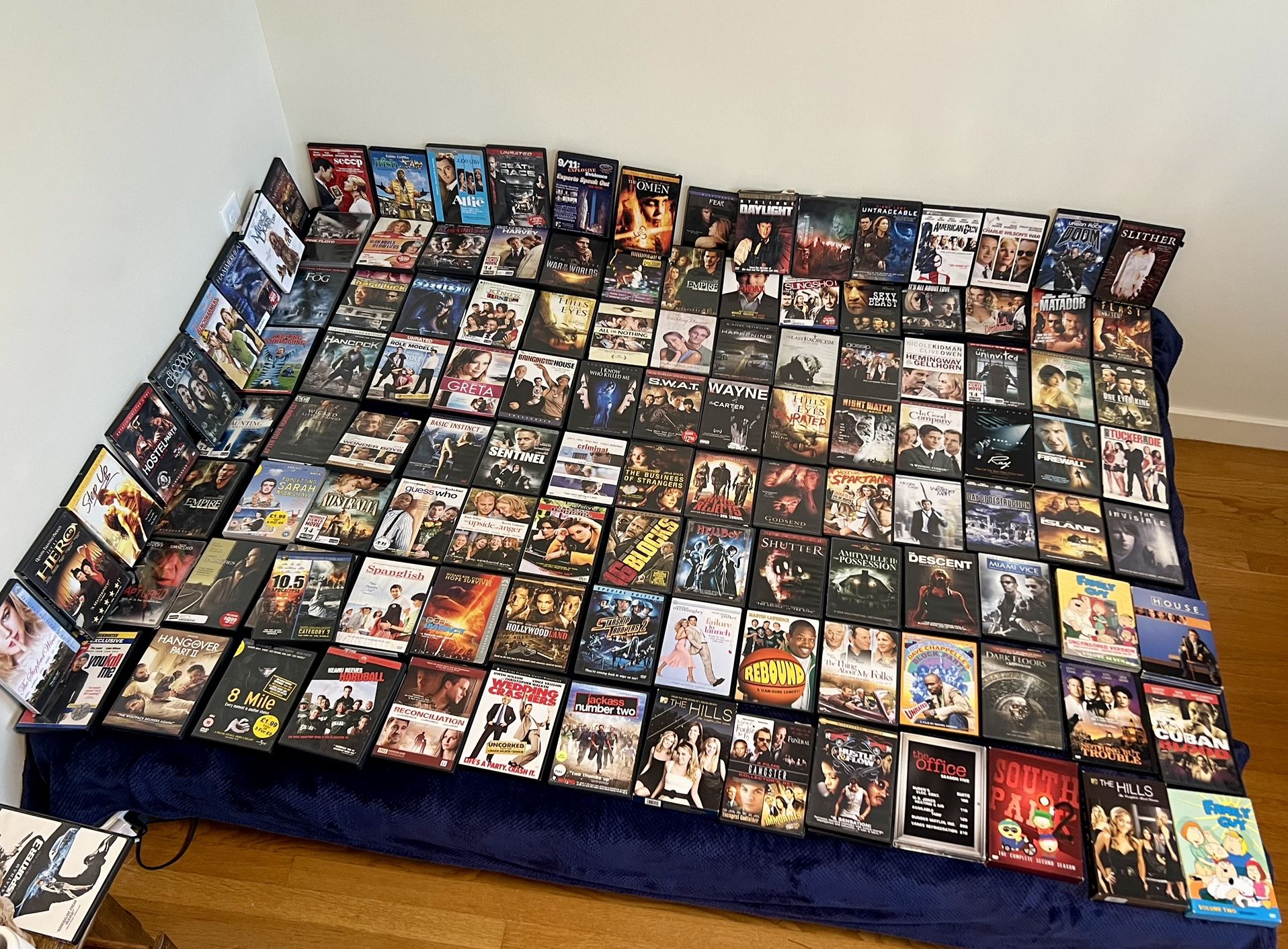 120 DVDs  + DVD player  $ 60
