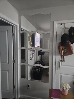 8 curvey  designer mirrors