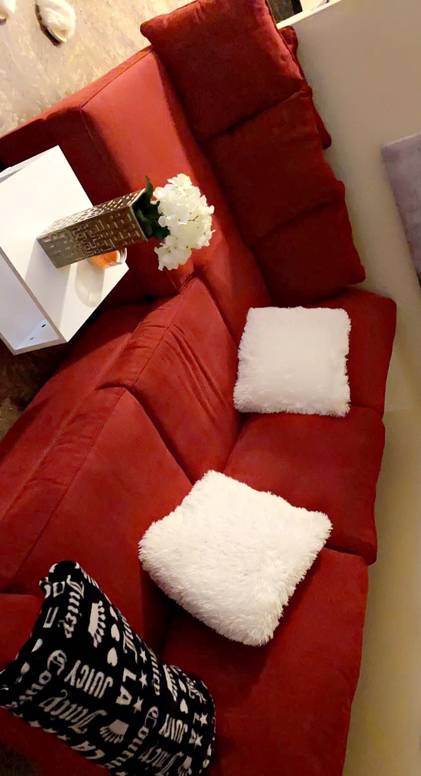 medium red Sectional couch 