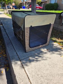 portable dog house or kennel large 
The carry bag is rip