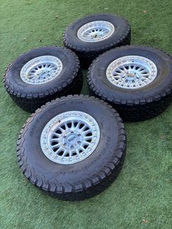 Ford KMC rims and used tires 315/70/7 ford rims 6x135