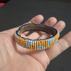 Handmade Seed Beads Bangle Bracelet In Geometric Patterns Of Light Blue, Orange & Dark Blue, Southwestern Style 2 3/8 Opening 