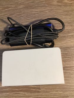 Nintendo Nintendo Switch OLED Model Dock (HEG-007) paired with a power adapter and cable.