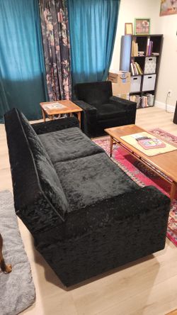 Midcentury modern crushed black velvet sofa and chair