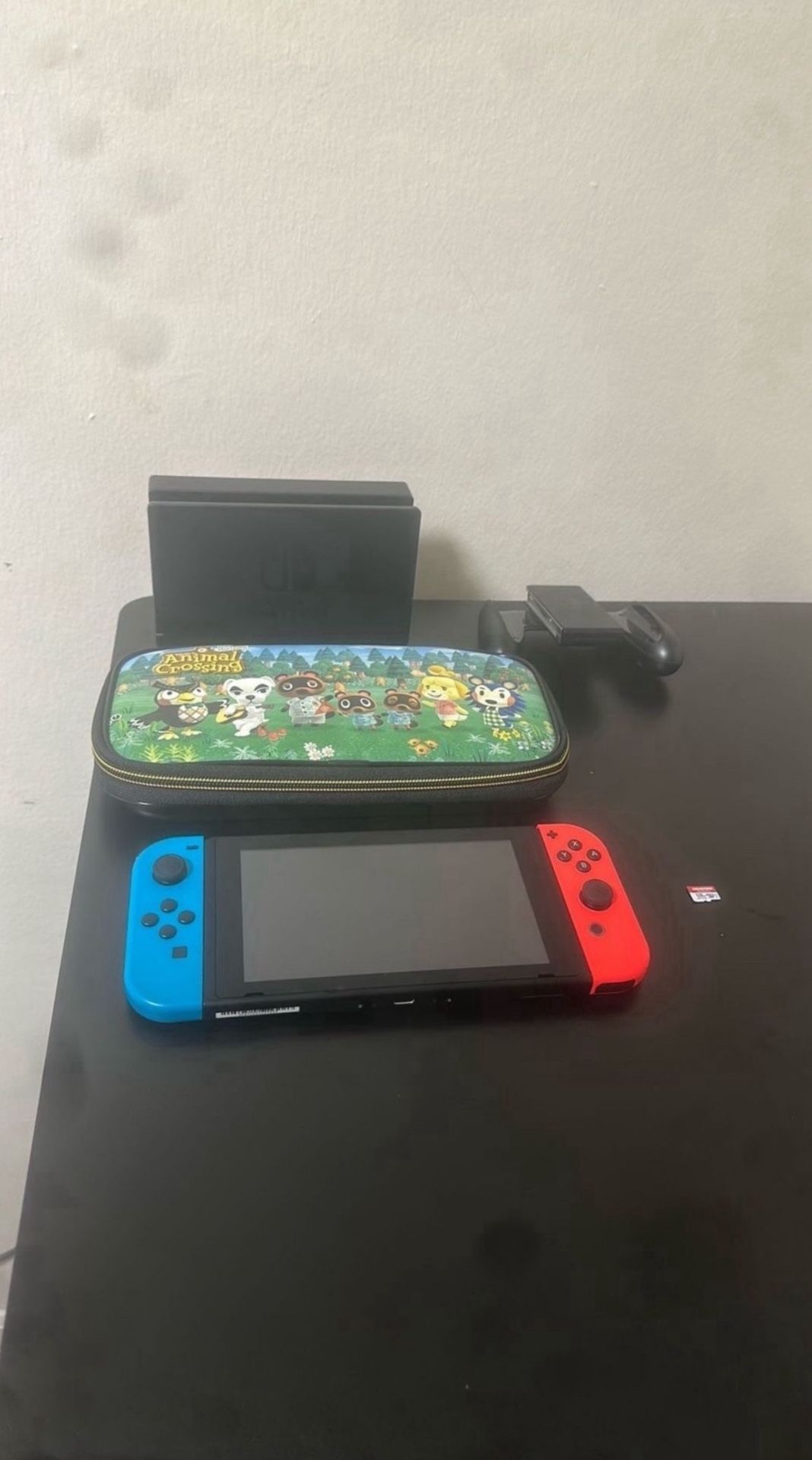 Nintendo Switch - Red/Blue Joy-Cons + Dock + 128GB SD + Joy-Con Grip + Case + Cables