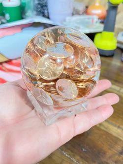 Uncirculated 1970 copper Pennies Encased in Clear Resin Sphere