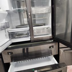 Un Refrijerador Cuatro Puertas SAMSUNG 90. Dias De Garantia Se Yeva Adomisilio