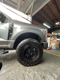 18” km557 8x170 ford F250 wrapped in 35” Falken at4