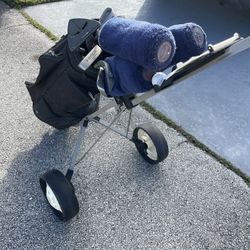 Golf Clubs And Cart 