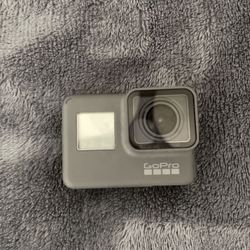 GoPro With Joby Tripod, 2 SD Cards, GoPro Cover And GoPro Stands