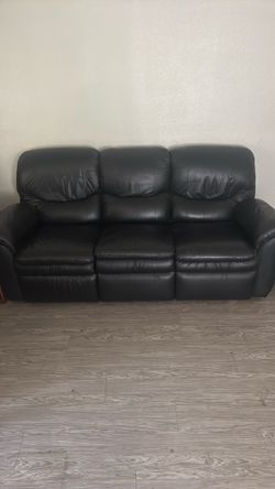 Leather coach sofa with 2 built in recliners