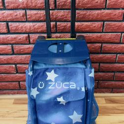 ZUCA Rolling Backpack – Blue Star Pattern – $150