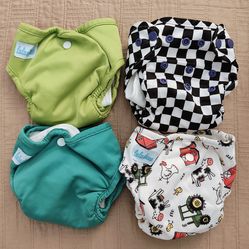Cloth diapers all in one size 1 new never used. Fontana pickup.